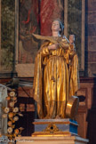<center>L'église Saint Michel </center>Sainte Christine, patronne de Solliès-Pont, avec à ses pieds la pierre de meule qu'on lui attacha au cou avant de la jeter dans un lac.