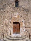 <center>Saint-Genis des Fontaines.</center>Ce monastère bénédictin a été fondé sous Charlemagne (vers 780) et dédié  à Saint Genis, martyr d'Arles (mort en 303).
Détruit au milieu du IXème s. par les normands, il est reconstruit peu après, et connaîtra un développement architectural tout au long du Moyen Âge : voûtement de l'église (XIIème s.), construction du cloître (XIIIème s.).
L'église St Michel, construite en même temps que le monastère, possède sur sa façade un bas-relief remarquable. Le linteau, en marbre blanc, est la plus ancienne sculpture romane datée (1019/1020)