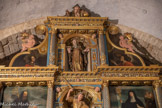 <center>Saint-Genis des Fontaines.</center>La statue de St Antoine, avec de part et d'autre,  la Vierge et l'Ange de l'Annonciation. Au sommet,  la figure du Père éternel, entouré par deux angelots tenant des « cornes d’abondance ».