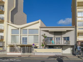 <center>Canet-Plage.</center>Villa Muchir. L’architecte, Férid Muchir, acheta le terrain en bord de mer en juin 1956 et fit construire deux villas mitoyennes isolées. L'originalité du plan, la distribution réduite au minimum pour une maison de vacances, la qualité de la composition et de l'espace ainsi que l'expression moderniste de cette villa présentent un intérêt majeur.