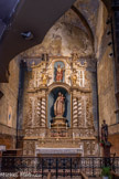 <center>Église Saint-Pierre de Prades</center>La chapelle du Mont Carmel. La clé de voûte de saint Éloi patron des orfèvres, forgerons et serruriers montre que primitivement la chapelle est celle de cette confrérie. Dans la niche centrale du retable de 1778 est placée la statue de Notre-Dame du Mont-Carmel (1866); au-dessus le Jean-Baptiste est encadré par saint Benoît et sainte Scholastique présents sur le retable à l'origine. À la base un panneau sculpté d'origine illustre le purgatoire et les âmes au-dessus des flammes implorant la Vierge. A droite, statue de saint Expedit.