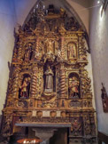 <center>Église Santa Maria de Cadaqués. </center>Retable de Saint Antoine de Padoue. Au deuxième registre, Saint Roch et Saint Antoine l'ermite encadrant Saint Jean-Naptiste. 1702.