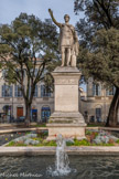<center>Square Antonin. 1862.</center>En 1864, la Ville de Nîmes charge le sculpteur nîmois Auguste Bosc de la réalisation d'une statue de l'empereur Antonin le Pieux en marbre de Carrare mise en place en 1874.