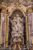 <center>Eglise ND de l'Annonciation. Chapelle Ste Rita.</center>Chapelle Notre-Dame-du-Mont-Carmel. L’ensemble décoratif est dominé par la magnifique statue mouvementée en marbre blanc de la Vierge et l'Enfant, présentant tous deux le scapulaire. Elle est l’œuvre du Génois J.B. Ansaldi (vers 1760-1771). La blancheur diaphane de la statue est rehaussée par les teintes soutenues du fond de la niche. Elle est encadrée par deux colonnes torses de marbres polychromes.