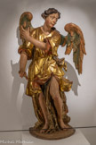 <center>Le couvent des franciscains.</center>Statue d'Ange. Bois doré polychrome.  1708 (sculpture), v. 1712 (dorure). Attribuée à J. Sunyer (sculpture) et F. Escribà (dorure). Retable du Christ de l'église paroissiale d'Espira-de-Conflent