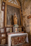 <center>Monestiès. L'église Saint-Pierre.</center>Sainte Geneviève tient de la main gauche la houlette, le bâton de berger terminé par une plaque de fer en forme de gouttière. De l'autre main, elle tient un livre ouvert. 17e siècle. Bois : taillé, peint (polychrome). Retable de la deuxième chapelle sud. Le tableau est surmonté d'un fronton triangulaire. Tableau : Religieuse en extase. 4e quart 18e siècle. Bois : taillé, peint, doré ; toile (support) : peinture à l'huile.