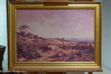 <center>Le musée Lapérouse.</center>Vue du tombeau du Père Receveur à Botany-Bay.
On aperçoit au fond le monument à la mémoire de Lapérouse.
(Reproduction du tableau de G.P. Ferry, 1854)