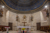 <center>Église Notre-Dame-de-l'Assomption de Bruniquel</center>La Vierge est entourée par les quatre évangélistes : Matthieu, Marc, Luc et Jean.