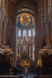 <center>Basilique Saint-Sernin de Toulouse</center>Ensemble du tombeau de saint Saturnin : un baldaquin de style baroque dans lequel se trouve une statue à la gloire du saint, sa sépulture, ainsi qu'une représentation de son supplice dans un bas-relief de plomb doré. Ce tombeau, auquel participa notamment le sculpteur Marc Arcis a été réalisé entre 1718 et 1759.