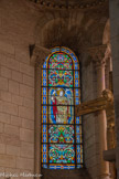 <center>Basilique Saint-Sernin de Toulouse</center>A droite, le Christ du comte Raymond IV. C'est un ensemble en bois recouvert de placages de cuivre doré et de diverses pierreries, travail exceptionnel du XIIème siècle.   Vitrail de Noel Lavergne, Assas, Paris, 1887.