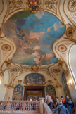 <center>Le Capitole.</center>Son fils, Paul-Albert Laurens, réalise le « Couronnement de Clémence Isaure » au plafond, ainsi que le tableau au-dessus de la porte. Au début du 16e siècle, la figure de Clémence Isaure symbolisant la « fin’amor » et la tradition courtoise, apparaît. Cette femme qui aurait légué sa fortune à la ville pour l’organisation des Jeux Floraux, devient la muse de cette cérémonie.
