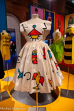 <center>Musée des Abattoirs</center>Robe de scène Calypso
1987
Robe à corsage sans manche à jupe évasée en taffetas de soie peint, tulle de polyamide, à motifs de signes et symboles protecteurs, créée pour le clip 