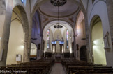 <center>L'église Saint-Sauveur.</center>Sa nef, orientée Nord-Sud à cause des accroissements successifs de la cour des comtes de Provence, est composée de trois travées qui s'ouvrent sur des chapelles latérales. Les différents styles architecturaux témoignent de la constante évolution de l'édifice à travers les siècles : nef de style gothique méridional du XVe, un transept et une abside du XVIe.