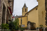 <center>Sainte-Agnès.</center>L'église Notre-Dame-des-Neiges aux tuiles en écailles vernissées.