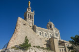 <center>Notre-Dame de la Garde</center>En 1851, les Administrateurs de Notre-Dame de la Garde demandèrent au Ministre de la Guerre l’autorisation de démolir la petite chapelle et de la remplacer par un sanctuaire plus grand surmonté d’un haut clocher. Il donna son accord le 5 février 1852. Le sanctuaire actuel est l'oeuvre d'Henri Espérandieu, de 1853 à 1874, en collaboration avec Henri Révoil pour le décor. La première pierre fut posée le 11 septembre 1853 par l’évêque de Marseille, Mgr Eugène de Mazenod. 
En 1516, François Ier constata que Marseille était très mal défendue, et en 1524 décida de faire construire deux forts à Marseille : l’un dans l’île d’If et l’autre sur le haut de la colline de la Garde où se trouvait la chapelle. Ce fort a la forme d'un triangle.. De ce fort d'importance assez modeste, subsiste l'éperon royal bien visible à l'ouest de la basilique. François Ier décida qu’en temps de paix les fidèles pourraient accéder à la chapelle en empruntant le pont-levis que, dans la journée, les soldats maintiendraient en position basse. En avril 1793, le duc d'Orléans Philippe Égalité, ses deux fils le duc de Montpensier et le duc de Beaujolais, sa sœur Louise duchesse de Bourbon et le prince de Conti sont emprisonnés quelques semaines à Notre-Dame de la Garde avant leur transfert au fort Saint-Jean. Il faudra attendre le 4 avril 1807 pour que la chapelle soit rendue au culte.