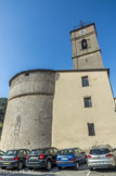 <center>Puget-Théniers</center>Eglise Notre-Dame de l'Assomption. L'appareillage régulier de l'abside avec trois baies d'égales dimensions (l'une étant dissimulée par le presbytère du XIXe siècle) et sa frise en dents d'engrenage semblent montrer que sa construction date du dernier tiers du XIIIe siècle. La frise est surmontée d'une corniche en quart-de-rond qui marque la limite entre la partie ancienne et les surélévations plus récentes.