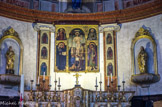 <center>Puget-Théniers</center>Eglise Notre-Dame de l'Assomption. Retable de Notre-Dame du Bon Secours. Le polyptyque est attribué à Antoine Ronzen. Il porte la date du 29 juillet 1525. Il n'en subsiste plus que le triptyque central. La seule œuvre signée d'Antoine Ronzen est le grand polyptyque de la Crucifixion qui se trouve dans la basilique Sainte-Marie-Madeleine de Saint-Maximin-la-Sainte-Baume. Les retables de Puget-Théniers et de Villars-sur-Var lui sont attribués par comparaison. D'origine flamande, formé à Venise vers 1500, il a travaillé en 1512 avec Antoine Bréa et s'est marié à Puget avant 1508.
On peut remarquer des palettes de couleurs nordique - gris, verts et bleus - et vénitienne - ocre et rouge vénitien. Par ses détails, on doit comprendre la signification symbolique du panneau central. Cette œuvre évoque l'intercession ou le « secours », c'est-à-dire la possibilité de s'adresser à Dieu par la médiation de Marie. Ainsi voit-on dans un mouvement ascendant les regards qui se suivent jusqu'à la main du Christ désignant le père. Les attitudes de la vierge « avocate des pécheurs » et du Christ supplcié, entouré des instruments de la passion, sont éclairés par le texte au pied de la croix emprunté à l'abbé Arnaud de Chartres (XIIe siècle)