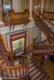 <center>Hotel Amédée Armand</center>Salle de bal avec un escalier en bois.