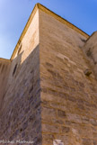 <center>Lunel</center>Tour des prisons. Accolée à la porte Notre-Dame, la Tour des prisons, dont la partie la plus ancienne de l'édifice date du XIIème s., conserve deux cellules aux murs recouverts de graffiti anciens.