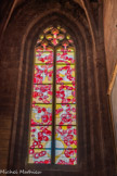 <center>La cathédrale Notre-Dame de Rodez</center>En 2003, l’artiste franco-suisse Stéphane Belzère réalise les vitraux de sept baies des chapelles du déambulatoire en utilisant une iconographie religieuse dans le style contemporain mais figuratif.