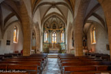 <center>Estaing</center>L'église Saint-Fleuret. De style gothique, l’église arbore de magnifiques retables, tableaux et statues, en bois dorés des XVII et XVIIIème siècles, mis en valeur par des vitraux contemporains de Claude Baillon.