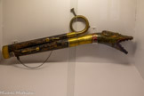 <center>Le musée du scaphandre. Espalion</center>Le Musée Joseph Vaylet. Le Serpent est un instrument à vent à embouchure, en bois, recouvert de cuir.
Au XVIIIe siècle il vient renforcer la basse dans les harmonies militaires.
La première forme du serpent, curviligne, est remplacée par des corps droits reliés par le bas. Le basson de Regibo (Liller. 1788) appelé aussi “basson russe