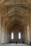 <center>Grande Chapelle </center>La Grande Chapelle du Palais des papes est une des réalisations architecturales majeures du pontificat de Clément VI. Vaste vaisseau de 52 m de long sur 15 de large et 20 de haut, la Chapelle Clémentine est un véritable tour de force de l’architecte Jean de Louvres. Ses dimensions exceptionnelles permettent de donner faste et solennité au service divin. Grâce à ses impressionnantes caractéristiques architecturales, la Grande Chapelle devient un laboratoire dans lequel se perfectionne la pratique du chant polyphonique rattachée à la liturgie connue sous le nom d’Ars nova, faisant d’Avignon une capitale musicale très en vue au Moyen-Age. Dédiée aux apôtres Pierre et Paul, elle accueille également les messes solennelles, les cérémonies du couronnement ou encore les funérailles. Achevée en 1351 après quatre années de travaux, le pape put y célébrer les fêtes de la Toussaint avant de mourir.