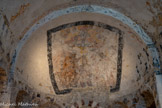 <center>Meysse</center>Dans le cul-de-four, le Baptême du Christ par Saint Jean-Baptiste est peint à l’intérieur d’un cadre noir. La scène comprend de nombreux personnages : au centre, Jésus, les mains jointes, debout dans les eaux du Jourdain ; à gauche, Jean le Baptiste, reconnaissable à son vêtement en peau de bête et à son bâton cruciforme ; à droite, un personnage tendant un linge. Dans la partie supérieure trône la colombe de l’Esprit Saint ; Dieu le Père, bénissant la scène, tient dans sa main un globe surmonté d’une croix. De part et d’autre, des putti sortent des nuages. Avant la restauration de l’église, cette peinture était recouverte par un décor floral du 18e siècle.