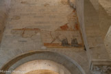 <center>Abbatiale Sainte-Marie de Cruas</center>L’Abbatiale a conservé des restes de fresques des XIVe et XVe siècles, non restaurés, mais seulement stabilisés. Comme la plupart des églises au Moyen-Âge, l’abbatiale était entièrement peinte. Sur le mur sud, on trouve la fresque de Saint Sébastien : on y distingue deux archers qui se font face et qui s’apprêtent à le cribler de flèches. Sébastien se trouvait au centre mais a aujourd’hui disparu. Les deux moines agenouillés en prière rappellent que nous sommes dans une abbatiale.