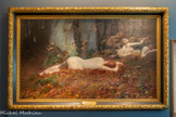 <center></center>Gabriel Guay
La Chapelle, 1848-Saint-Leu-la-Forêt, 1923
Poème des bois
Exposé au Salon en 1889 Huile sur toile
Guay exposa au Salon de 1873 à 1912, à la fois des portraits, des scènes mythologiques, religieuses et littéraires, ainsi que des nus féminins parmi lesquels ce grand tableau. Quatre femmes sont allongées sur un lit de feuilles mortes, nymphes sylvestres surprises dans leur intimité. De nombreuses œuvres de ce type furent présentées au Salon dans les dernières années du XIXe siècle, s'attirant les foudres d une partie des critiques qui avaient repéré leur caractère ouvertement racoleur.
Inv. 121
Hist : achat de l'État en 1889 ; dépôt en 1890 ; propriété transférée à la ville de Draguignan le 18 juin 2015