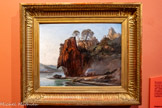 <center></center>Les premiers peintres séjournant sur la côte au XIXe siècle cherchent à. saisir rencontre clés rochers ronges et de la mer, comme Adolphe Fioupou, dans cette œuvre figurant le rivage entre La Napoule et Théoule-sur-Mer.
Un groupe de pêcheurs semble préparer le repas, mais l’atmosphère de repli — presque de refuge —, suggérée par la réunion des personnages autour d’un feu au pied d’un rocher menaçant leur embarcation, renforce la sensation de mystère autour de l’Estérel. <br> Falaises et roches rouges de l’Estérel
Adolphe Fioupou
(1824, Le Cannet — 1899, Le Cannet)
Huile sur panneau 27 x 35 cm Cannes, musée des Explorations du monde,