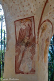 <center>Chapelle Notre-Dame de Ben-Va</center>Pilier sud-ouest : SAINT CHRISTOPHE), en tunique sombre très courte et manteau ocre rouge, le passeur du Christ, de taille impressionnante, aurait les pieds dans l'eau, pour faire traverser le gué à l'Enfant divin, assis sur son épaule, et bénissant. Christophe protège des dangers de la route et de la mort subite.