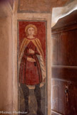 <center>Chapelle Notre-Dame de Ben-Va</center>SAINT ELOI (Eligius) portant manteau court, tunique ocre, chaussures bleu-vert. Il tient un marteau et une paire de tenailles serrée sur sa poitrine. C'est le métallurgiste, patron des orfèvres, des maréchaux-ferrants et des charretiers fêté le 25 juin, particulièrement vénéré en Provence : Sant Aloi.