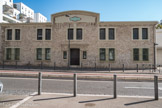 <center>L'école Chevalier Paul.</center>C'était une manufacture de tissus : les entrepôts Noailles Textiles, construits en 1912.