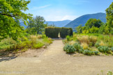 <center>Musée Champollion</center>Vue générale du jardin d'agrément avec, dans le fond, le Grand Brion (à droite) et le massif du Taillefer. Derrière la haie, le parc Champollion  est une vaste prairie, trace des anciennes terres agricoles qui nourrissaient la maison des champs, clôturé par un mur d'enceinte.  
Les grands parents des des deux frères, Barthélémy Champollion et Marie Géréoud sont nés dans le Valbonnaus. Leur père, Jacques Champollion, est expulsé de son hameau natal pour des causes peut-être politiques et doit sillonner la France comme colporteur avant de s'installer à Figeac en 1770. Il ouvre la première librairie de la ville, place de la Halle, lieu très fréquenté par la population cultivée de la ville. Il s’installe dans une maison, rue de la Boudousquerie, actuelle rue de Frères Champollion. En 1773, il épouse Jeanne-Françoise Gualieu, la fille d’un marchand de la ville. Ils auront sept enfants. Après ses études, Jacques- Joseph est, de 1794 à 1797, commis au bureau de la correspondance générale du district de Figeac. En 1798, il s'installe à Grenoble où ses cousins lui ont trouvé une place de commis dans leur affaire Il prend sous son aile son jeune frère Jean-François et le fait venir à Grenoble en 1801.