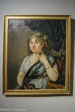 <center>Le salon.</center>Pauline Berriat (1784 - 1813)
Pauline est la cadette des enfants de Pierre et Françoise Berriat. De six ans plus âgée que Jean François, elle inspire à l'adolescent un premier amour de jeunesse, qu’il lui déclare dans une lettre.
L’amourette non partagée est raillée par l’aîné des Champollion, qui la désapprouve. Jean François, éconduit, connait à seize ans sa première peine de cœur.
Vers 1800, huile sur toile.